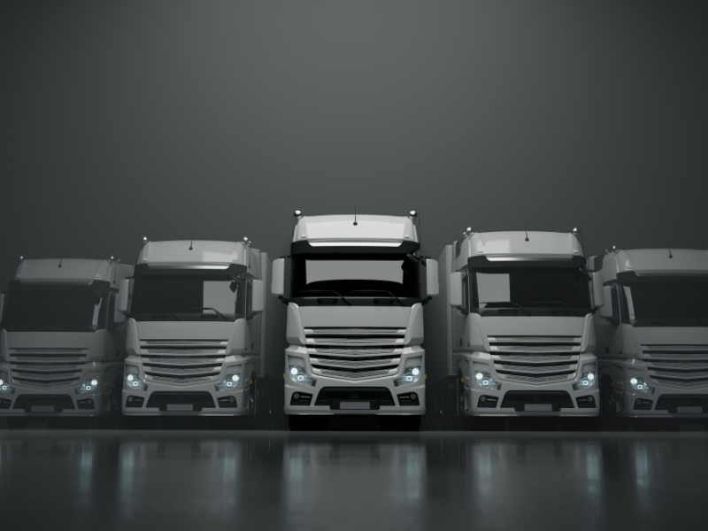 samochody ciężarowe w szeregu